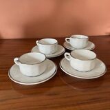 Four porcelain "bistro" cups and saucers