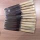Set of 25 horn and stainless steel knives