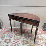 Half-moon table in mahogany from the Louis XVI period, 18th century.
