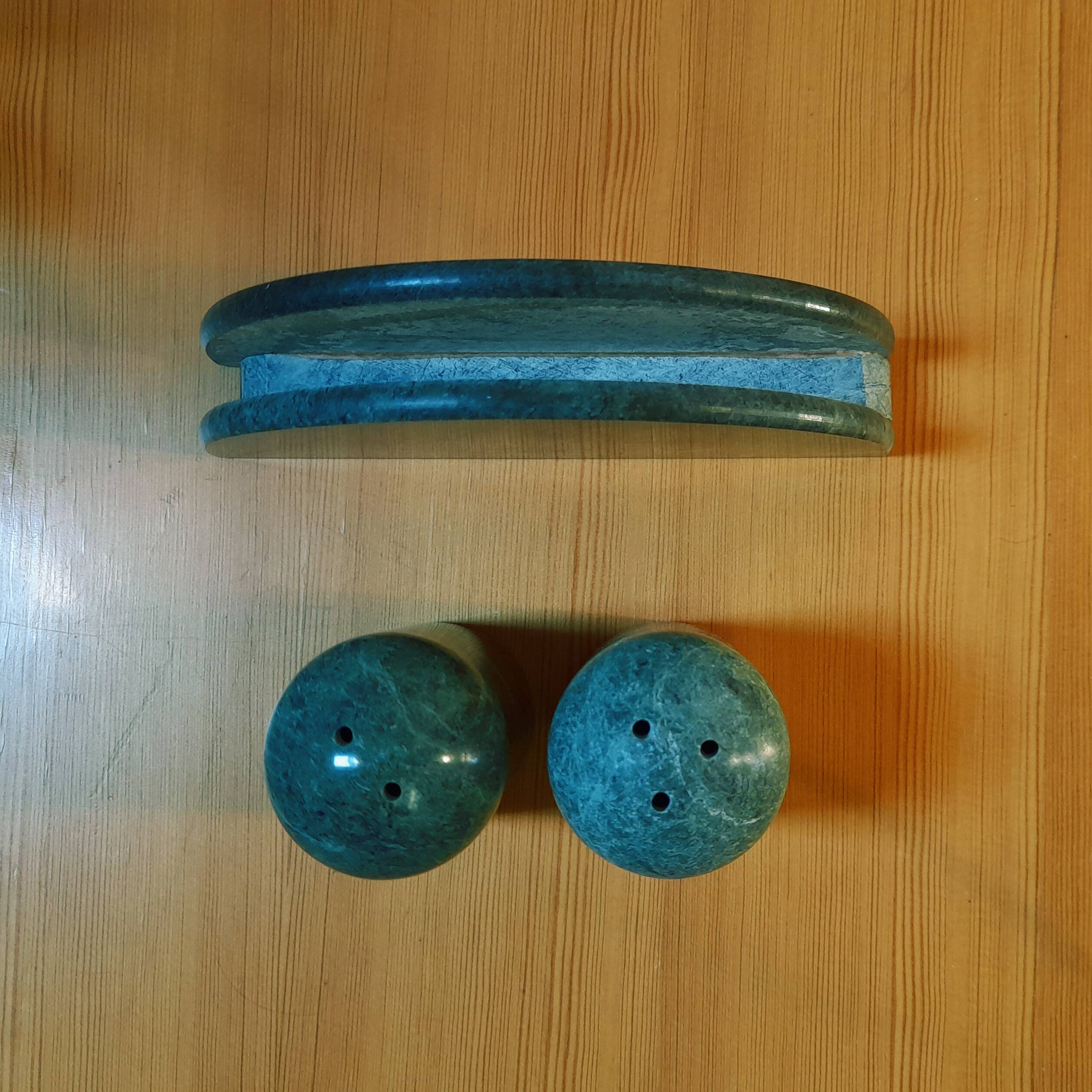 Trio of salt shakers, pepper shakers and napkin holders in green marble