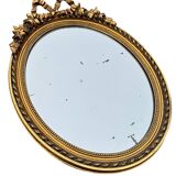 Round mirror with ribbon in Louis XVI style – 19th century