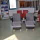Vintage 1960 set of 4 armchairs and ottomans in grey fabric and black faux leather.