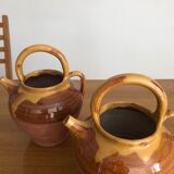 Pair of vintage terracotta watering cans