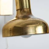 Set of three brass adjustable wall lamps