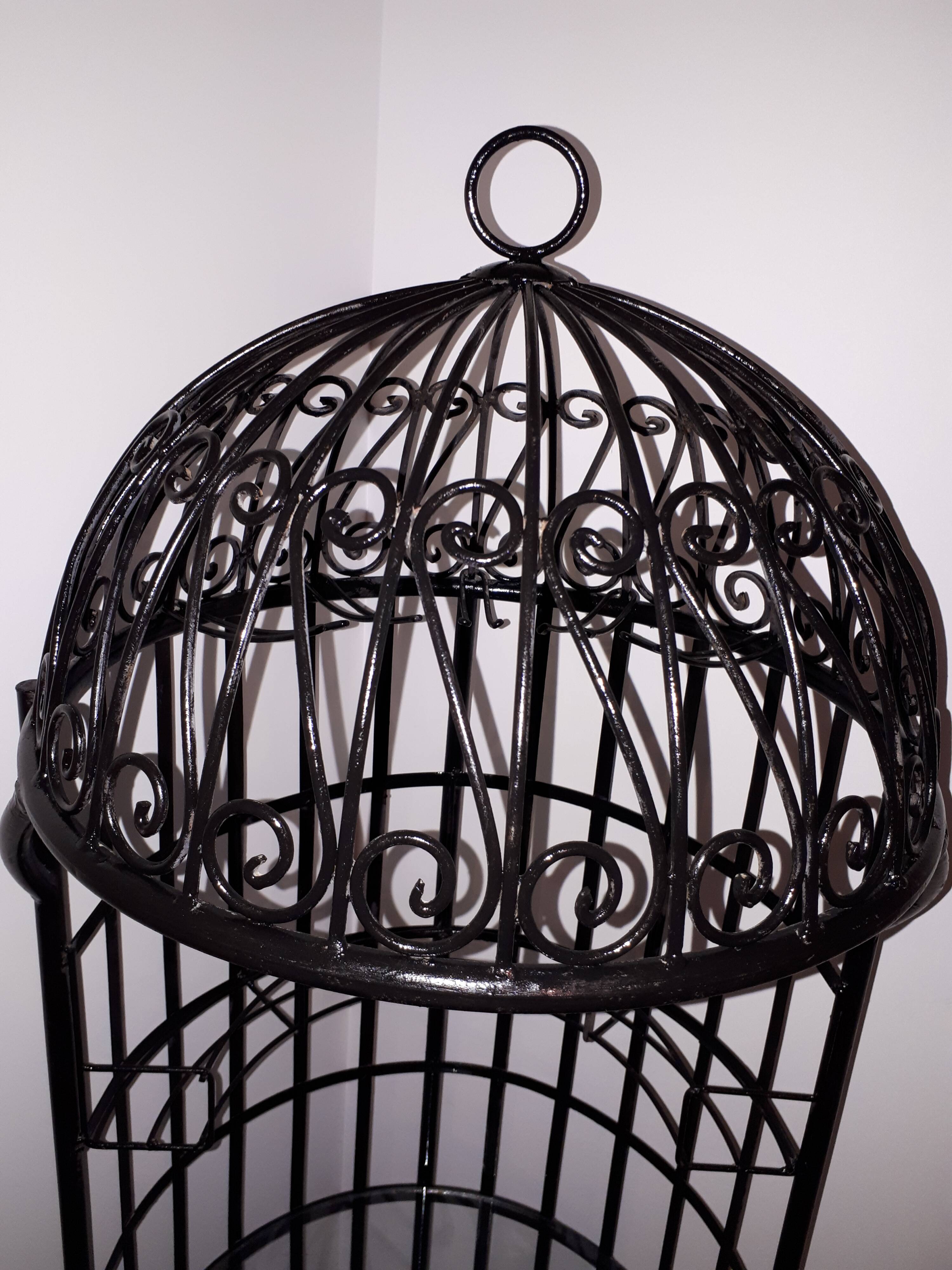 Wrought iron bar with bottles holder