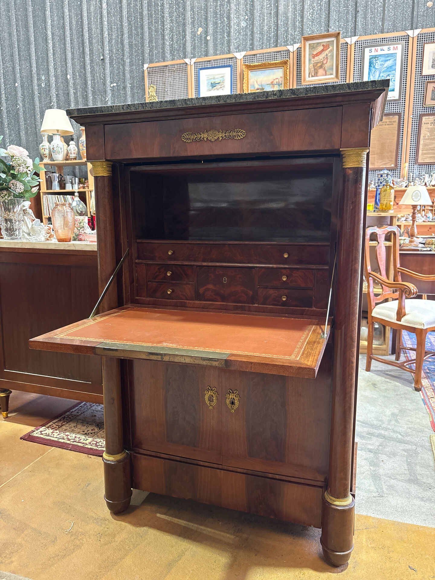 Empire secretary in mahogany, bronze and marble with secret drawers.