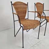 Pair of wicker and iron armchairs by Frederic Weinberg, United States, 1950s.