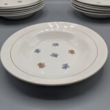 12 hollow porcelain plates, floral decoration and golden ledé - ∅: 23cm
