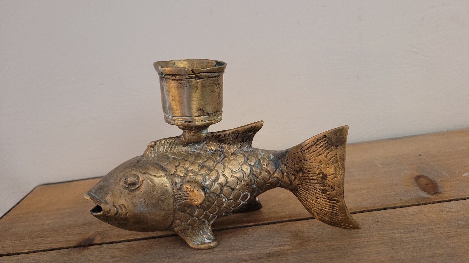 Yellow copper fish candle holder