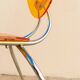 Ensemble de 2 chaises en acrylique orange, style postmoderne Memphis, design italien des années 1980 avec des cadres en chrome.