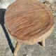 Rustic three-legged stool in minimalist wood in the style of Touret.