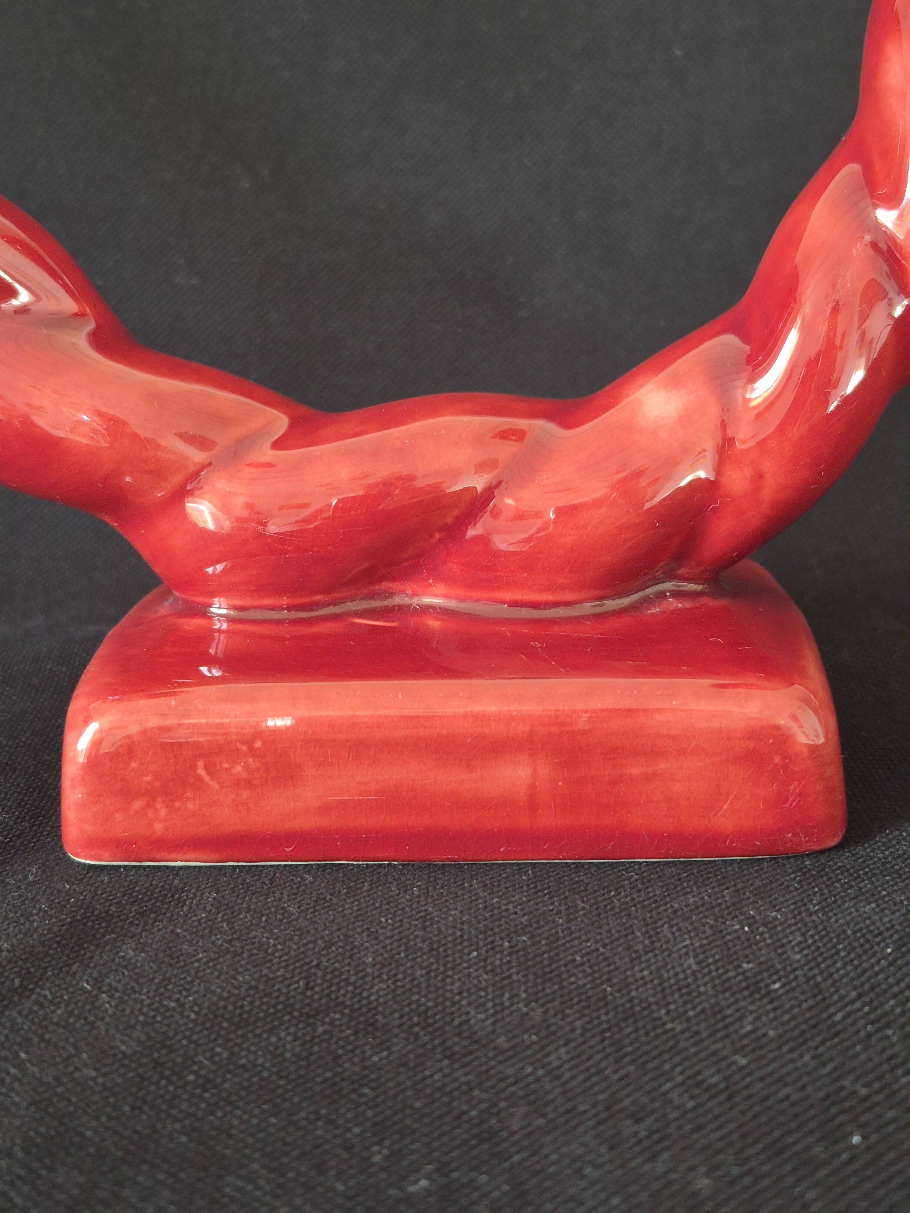 Ceramic chandelier, signed LONGCHAMP, twisted old red