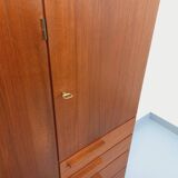 High Scandinavian modernist vintage sideboard in teak and black metal.