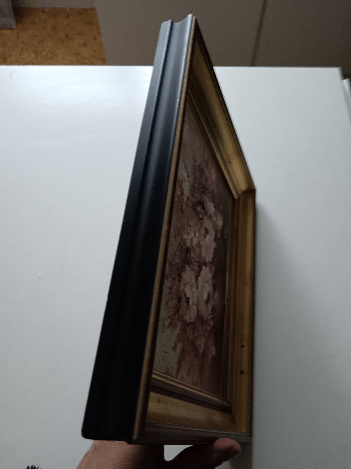 Oil of a bouquet and its lovely frame