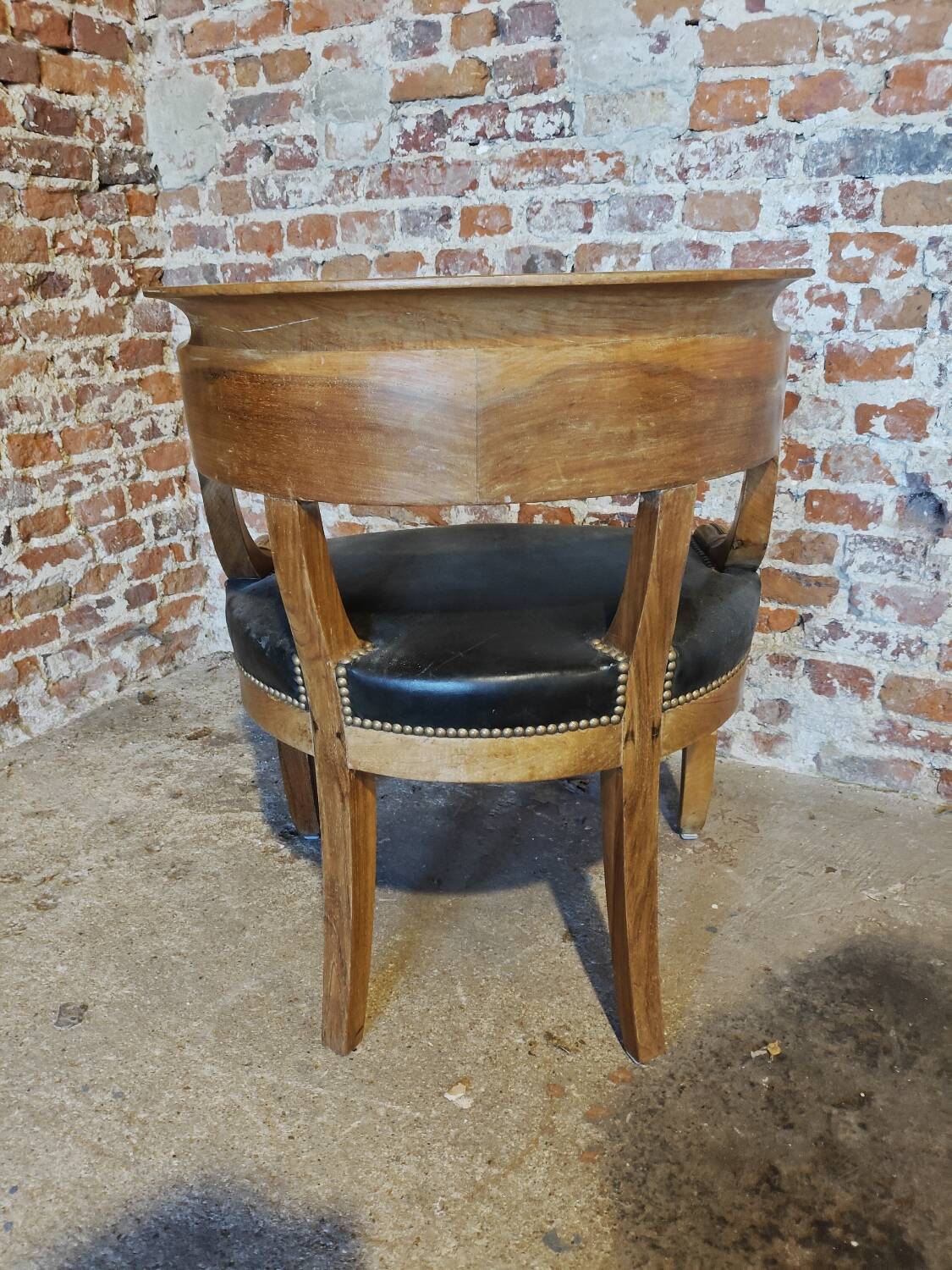 Antique Empire armchair in wood and black leather – gondola backrest