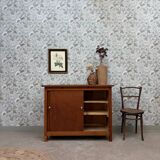 Vintage sideboard with sliding doors