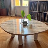 Organic coffee table in travertine.