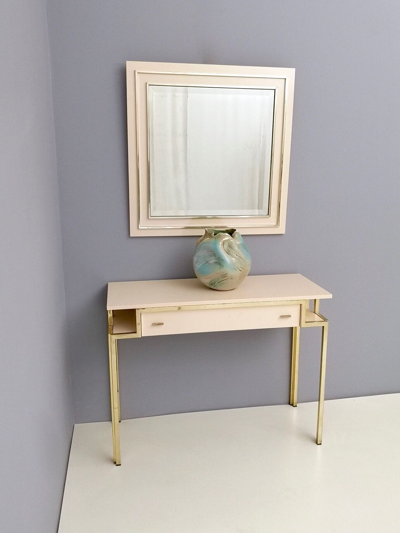 Postmodern pale pink formica and brass console with wall mirror, italy