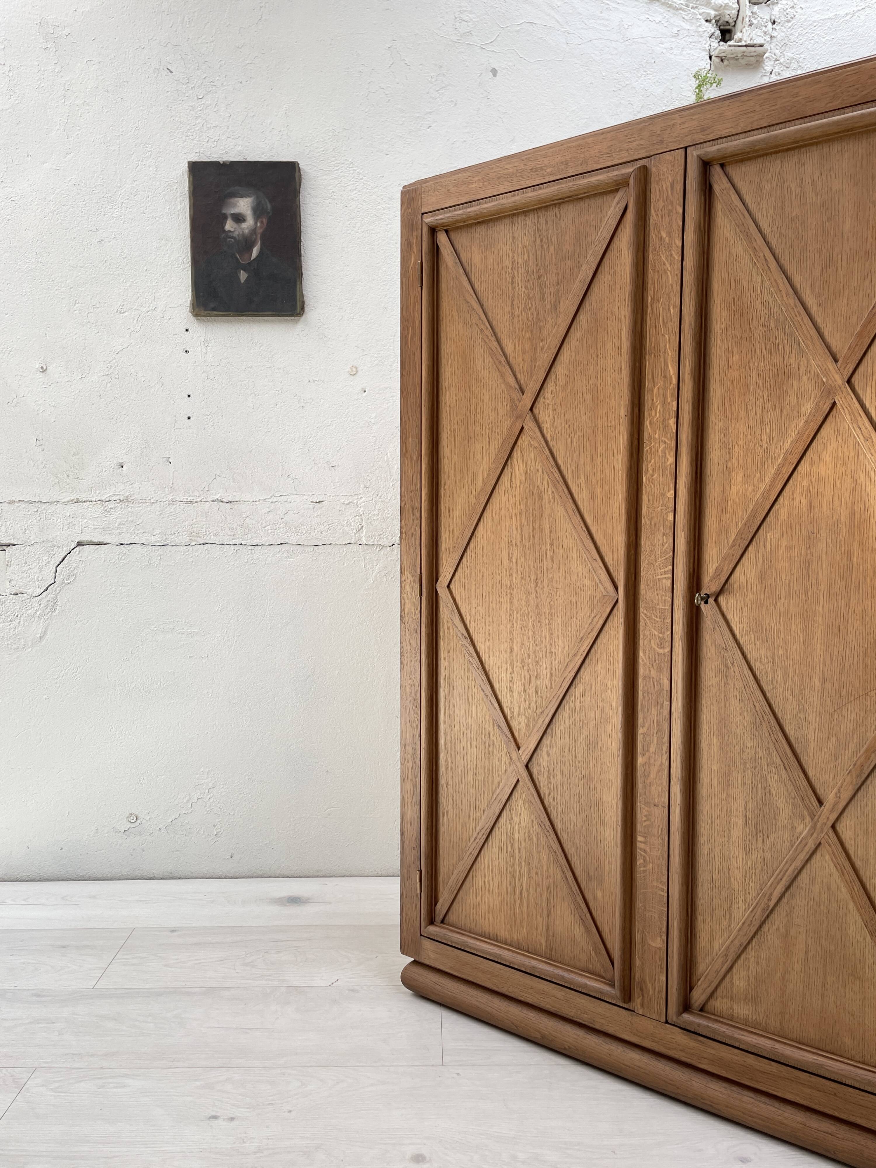 Storage unit in solid oak and veneer, circa 1960.