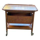 Vintage retractable tea trolley on wheels