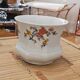 White porcelain pot (cache-pot) with floral patterns from Wunsiedel.