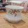 White porcelain pot (cache-pot) with floral patterns from Wunsiedel.