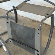 Vintage cantilever lounge chairs — pair, grey leather and tubular steel