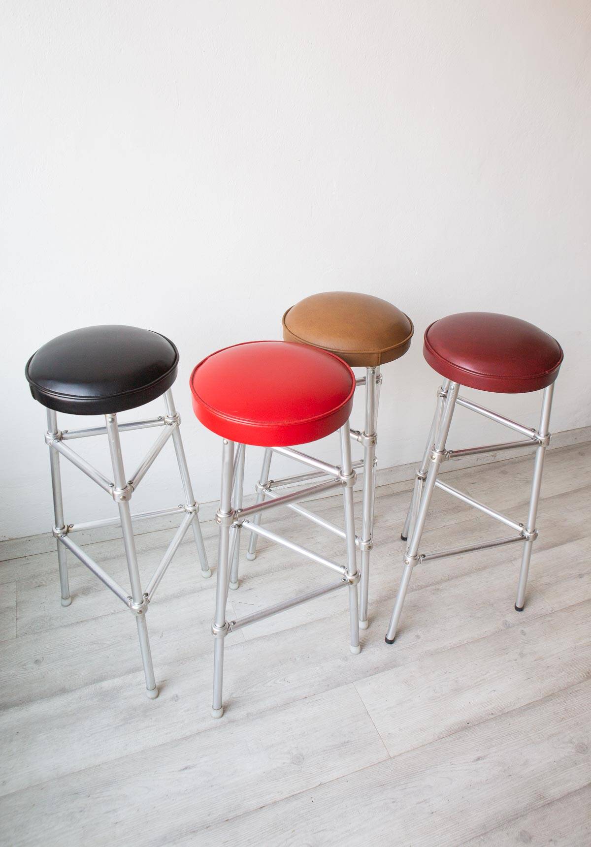 Set of 4 bar stools in aluminum and colored leatherette circa 1980