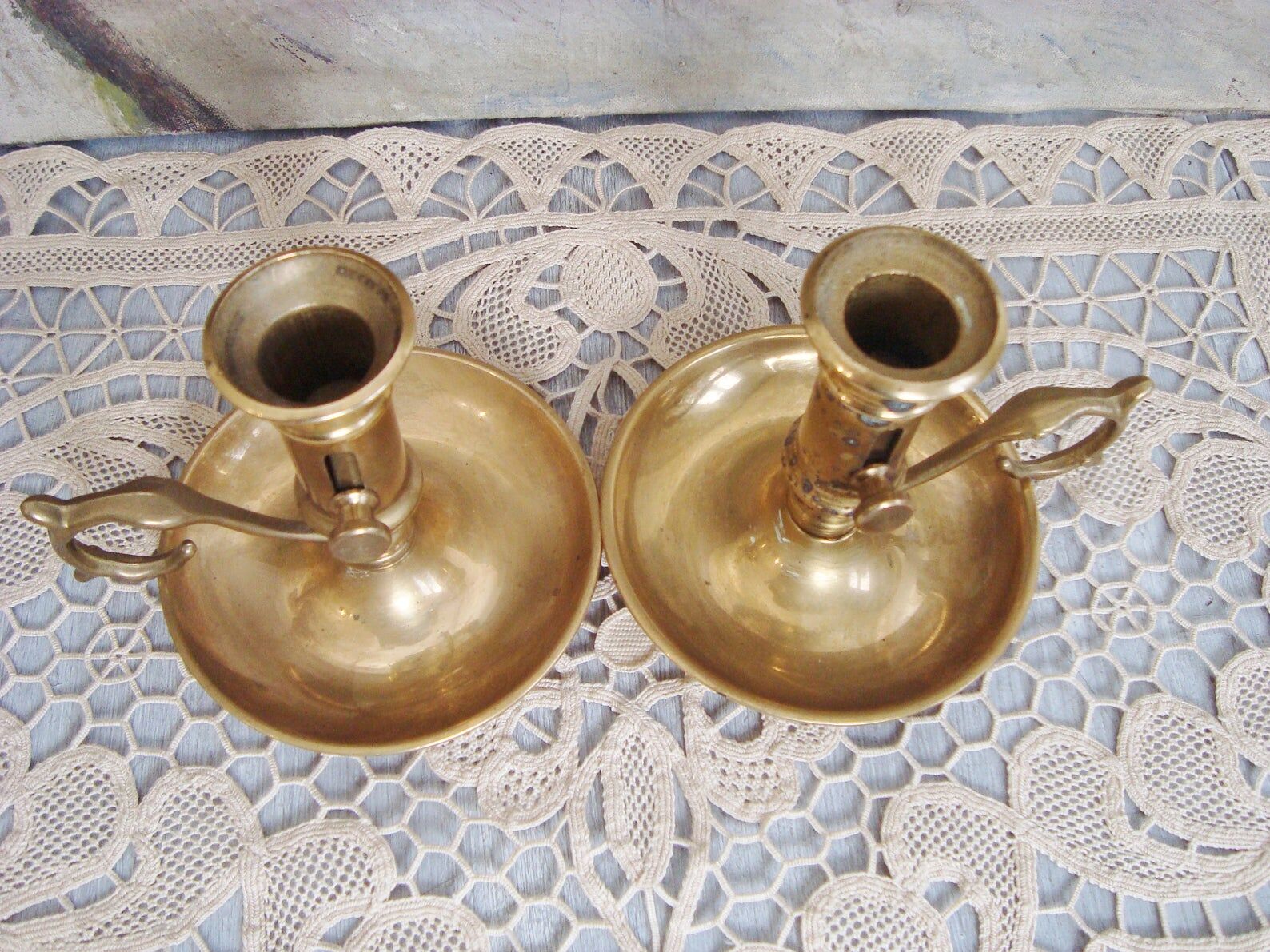 Pair of brass cellar rat candlesticks