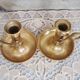 Pair of brass cellar rat candlesticks