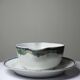 Old Luneville sauce boat, opaque porcelain with polychrome decoration.