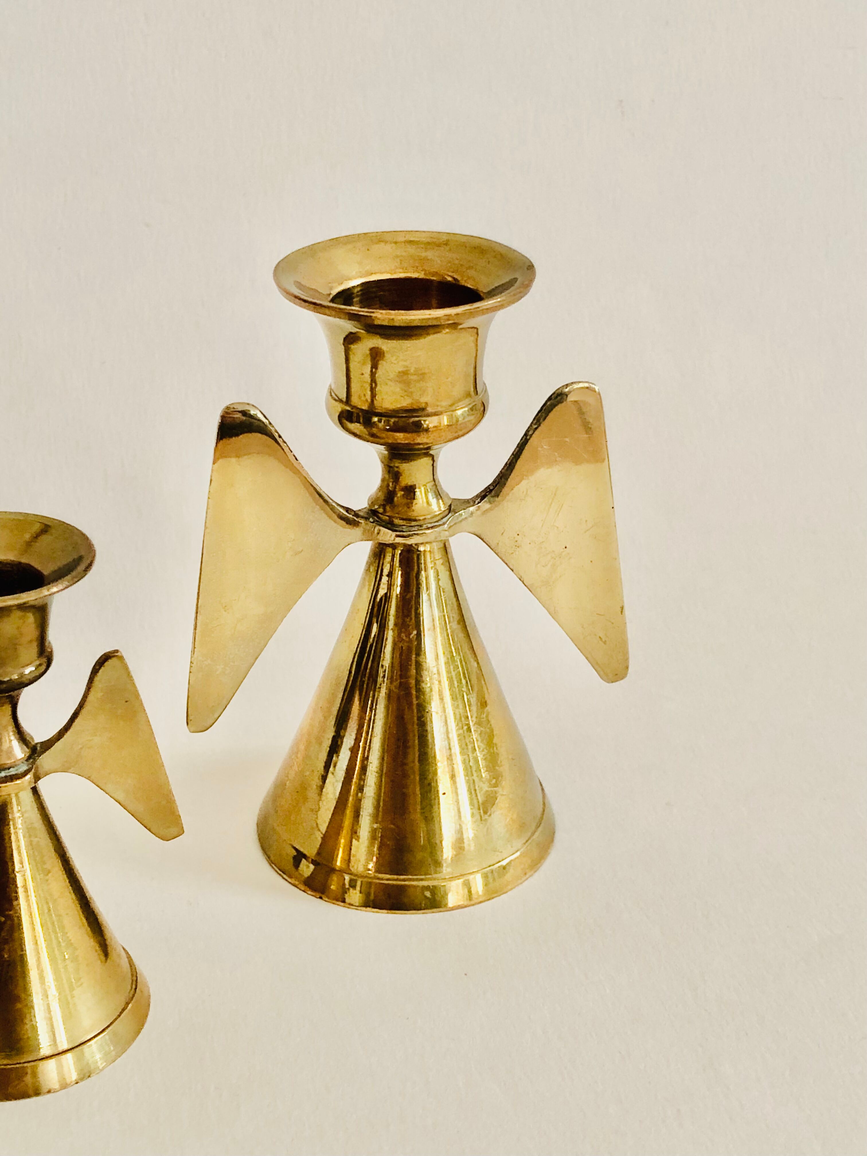 Duo of brass angel candle holders