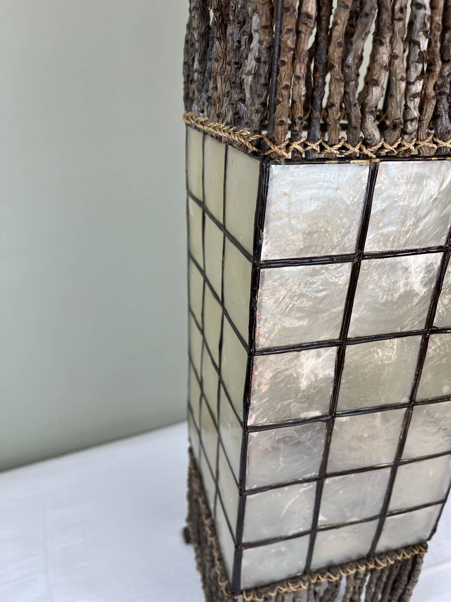 Capiz shell lamp and woven twigs