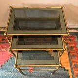 Brass tables and smoked glasses