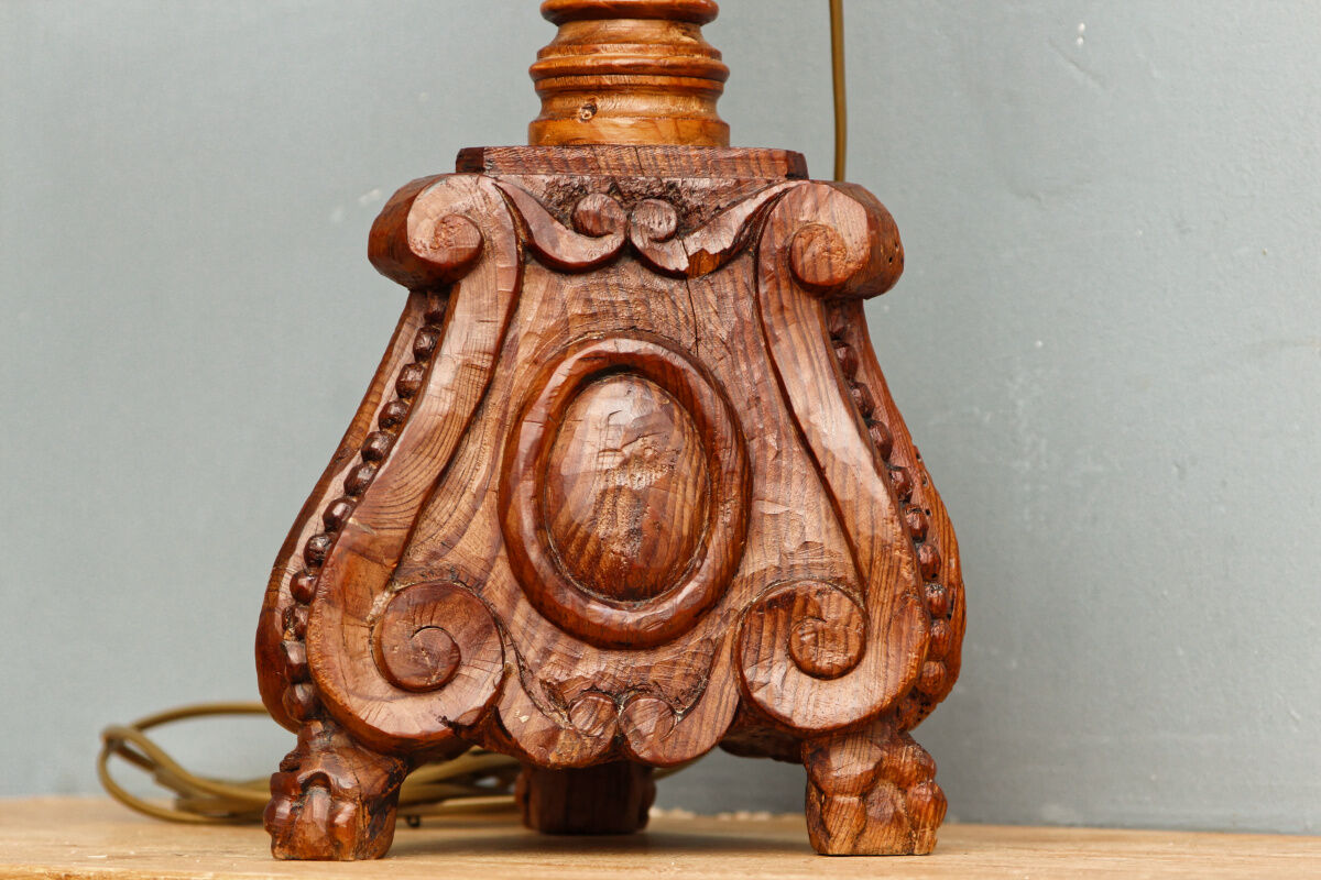 Carved wooden lamp, fiber shade