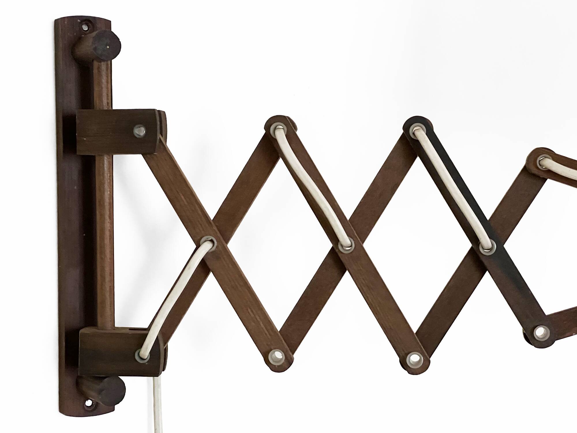 Wall lamp/scissor lamp in died pine wood from Translandia. Denmark 1960s