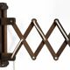 Wall lamp/scissor lamp in died pine wood from Translandia. Denmark 1960s