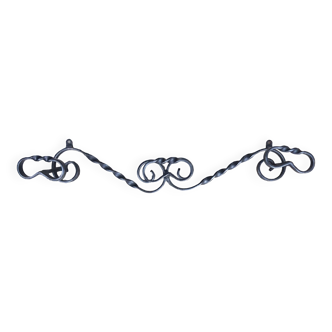 Wrought iron wall coat rack