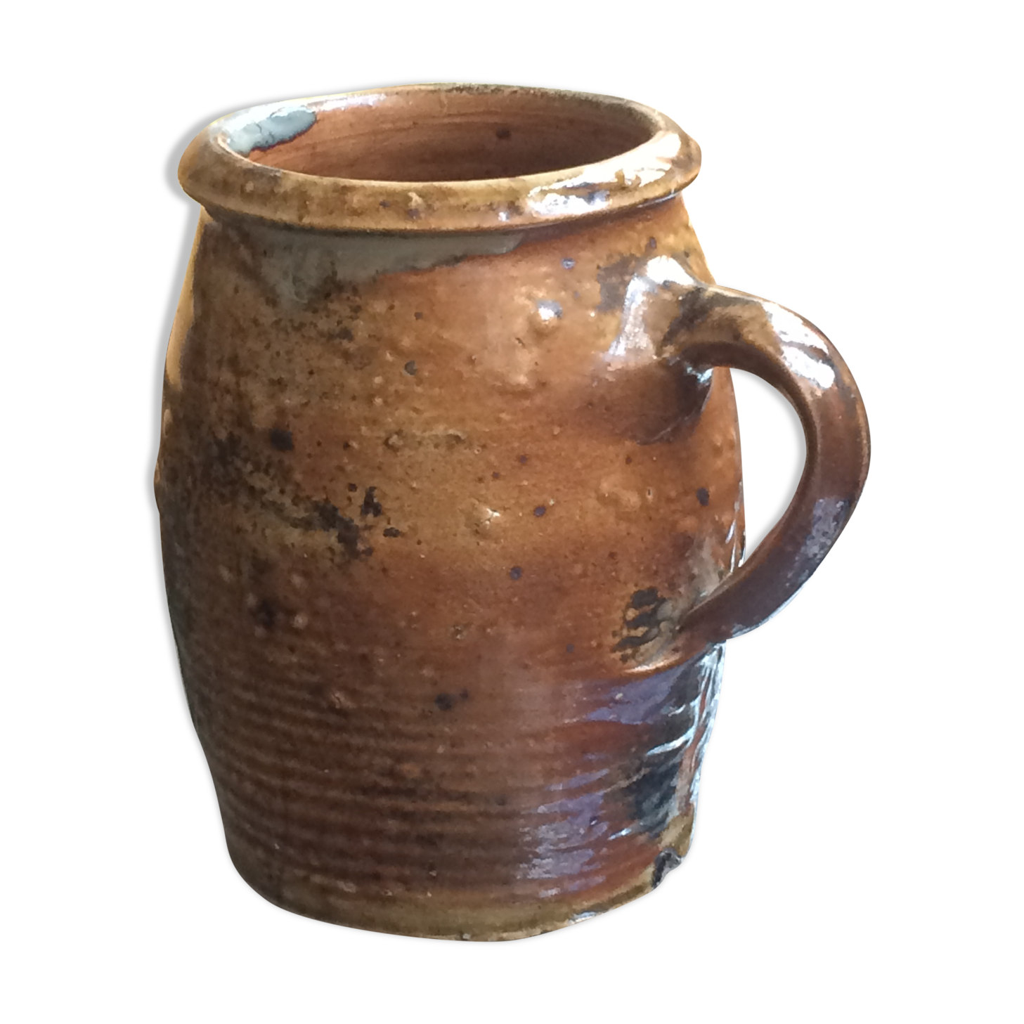 Veneered earth jug