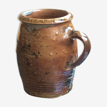 Veneered earth jug