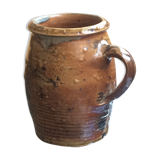 Veneered earth jug