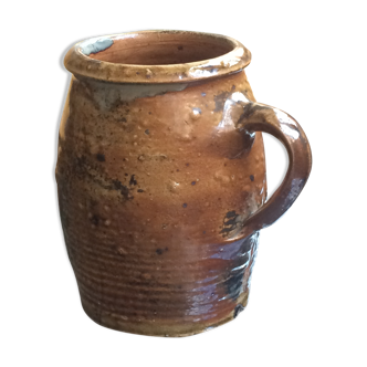 Veneered earth jug