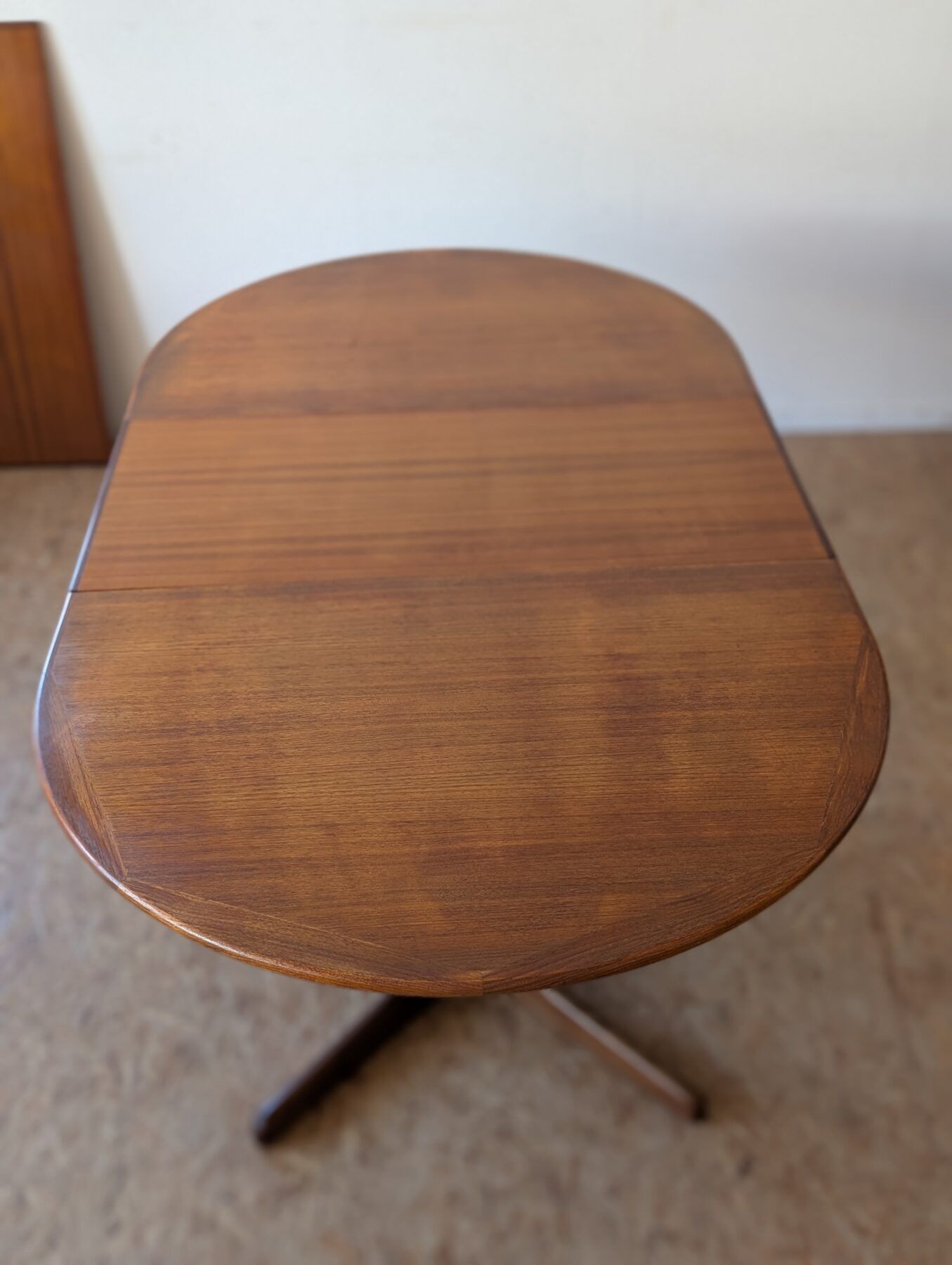 Scandinavian teak oval table from the 1960s, extendable up to 243 cm.