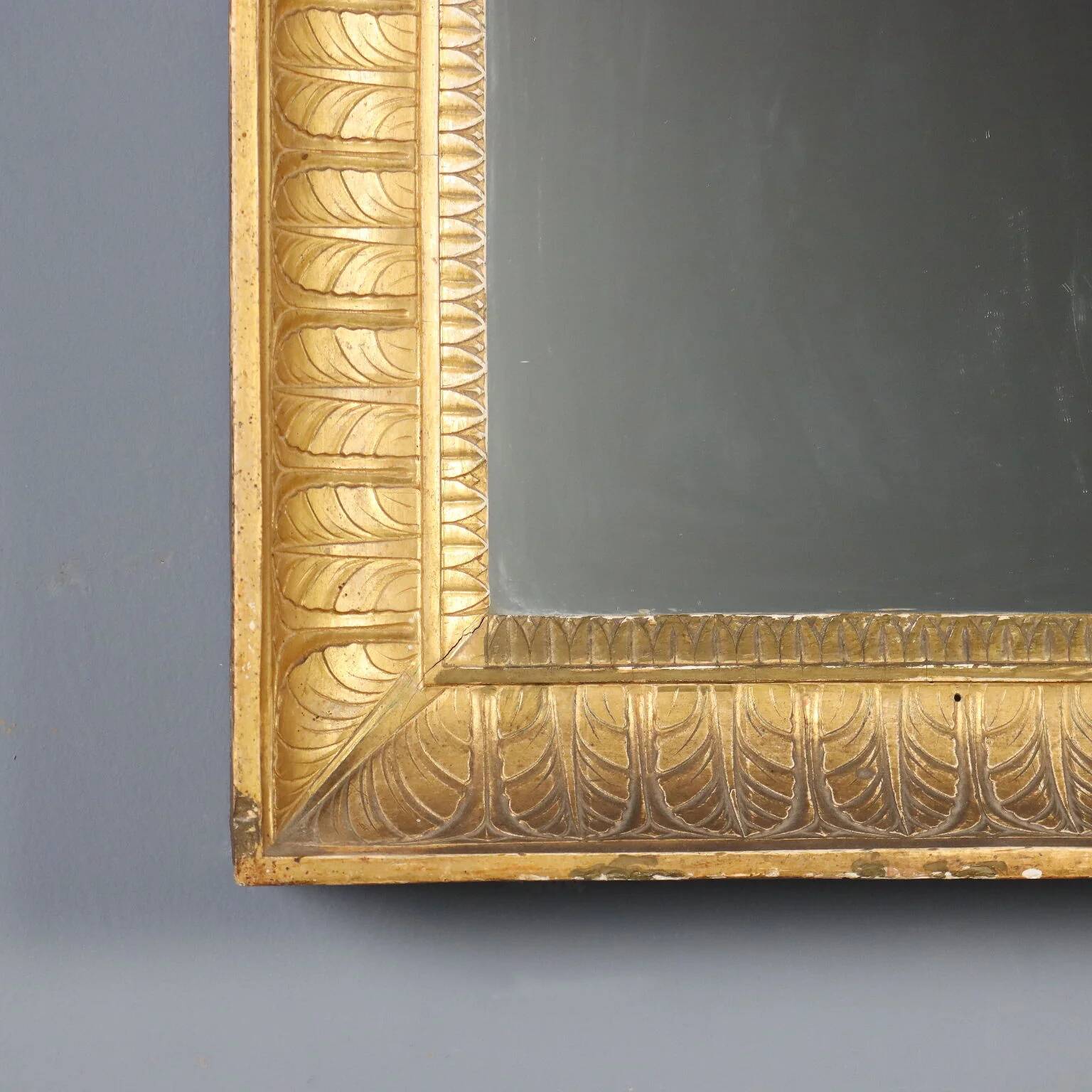 Antique Empire mirror in gilded wood, Italy, 19th century.