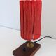 Lamp in wood, brass and wool