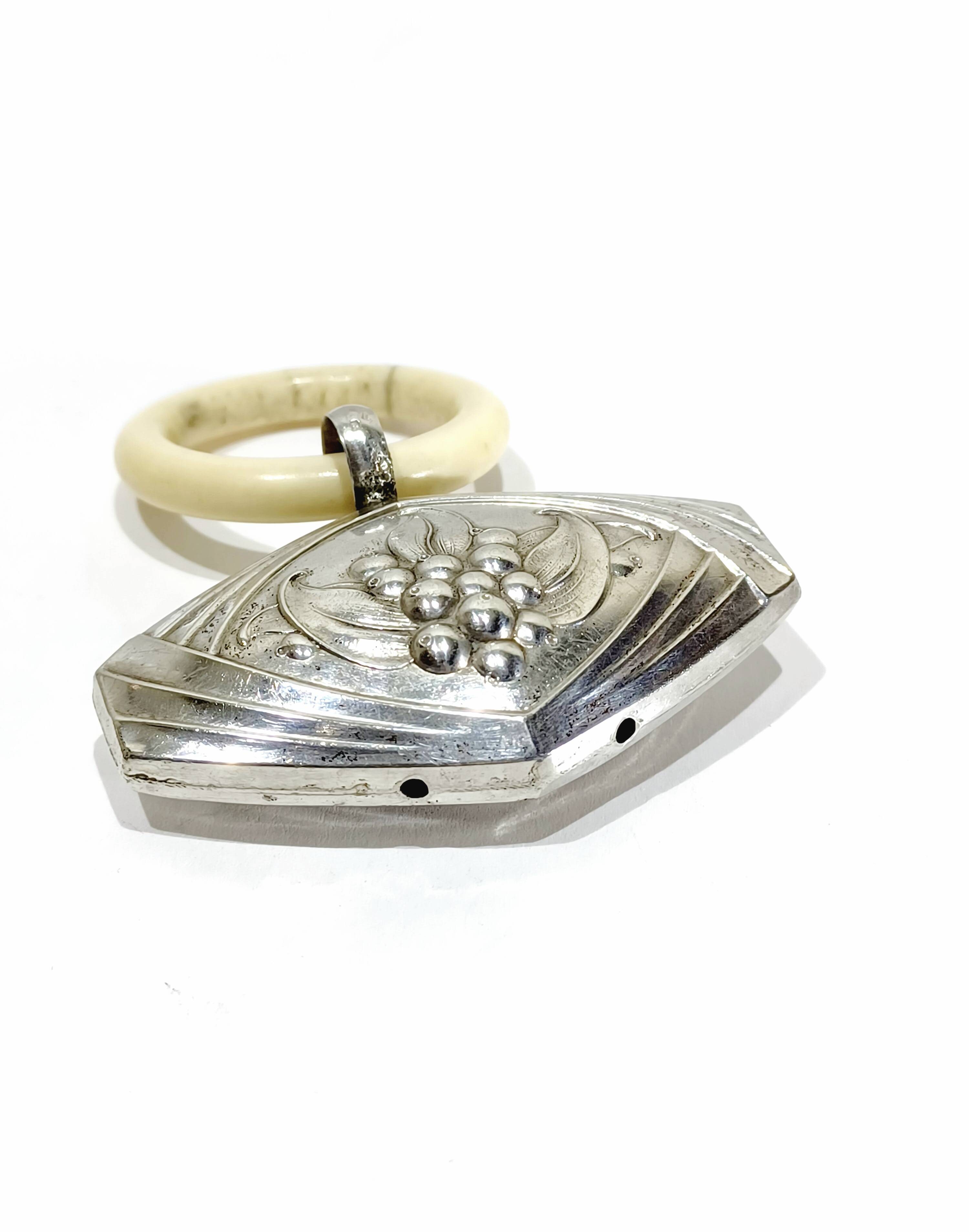 Solid silver rattle