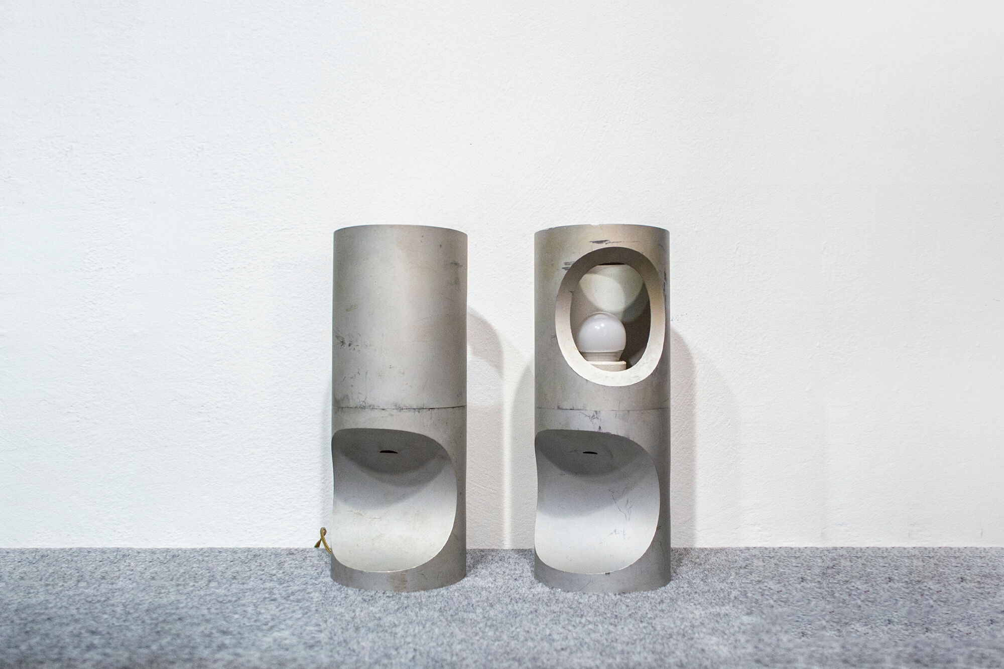 Pair of burnished aluminum lamps Italy 50s