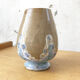 Enamelled sandstone vase
