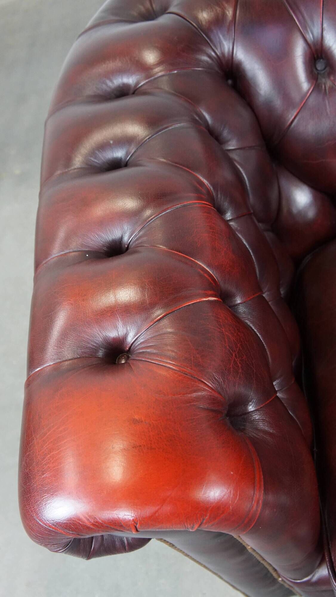 Original English Chesterfield sofa in red cowhide 2 seater