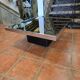 Chrome coffee table with smoked mirror top
